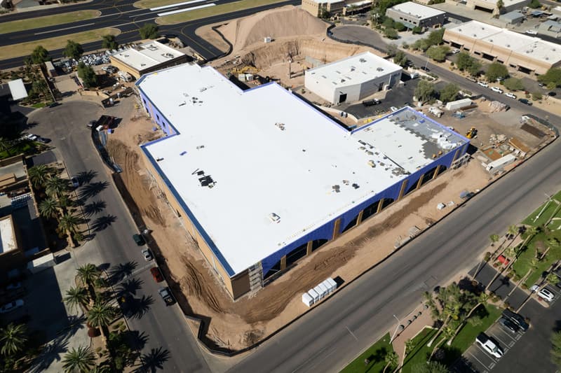 Aerial view of rough grading along a new commercial building on a Diamond West project in Arizona